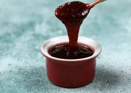 تصویر 3 از رب انار طبیعی با رنگ تیره و عطر عالی